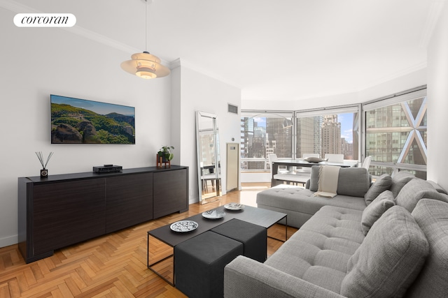 living room with light parquet floors and ornamental molding