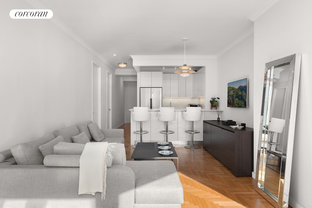 living room with light parquet floors and crown molding