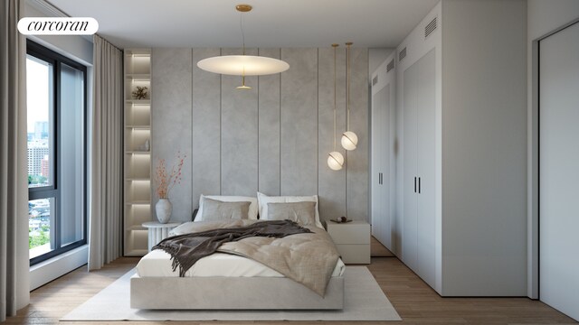 bedroom featuring light wood-type flooring