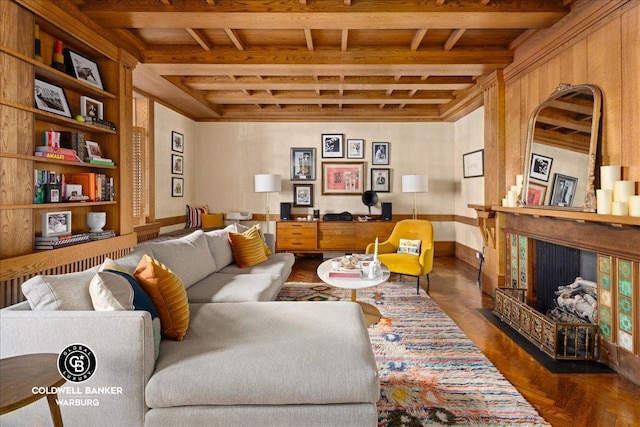 living room with beamed ceiling and dark parquet floors