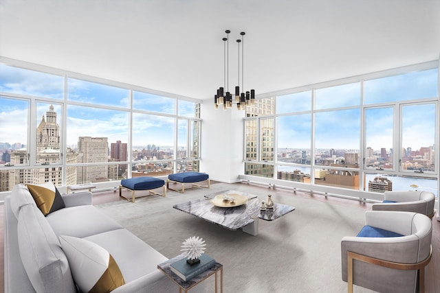 living room with expansive windows and a healthy amount of sunlight