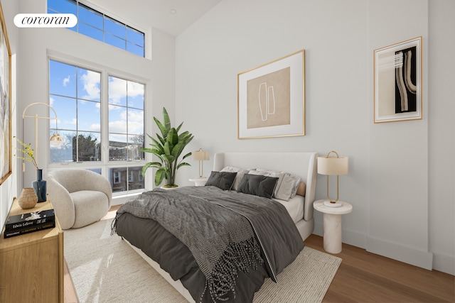 bedroom with hardwood / wood-style floors