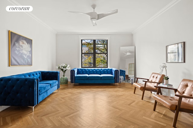 sitting room featuring ceiling fan, crown molding, and light parquet floors