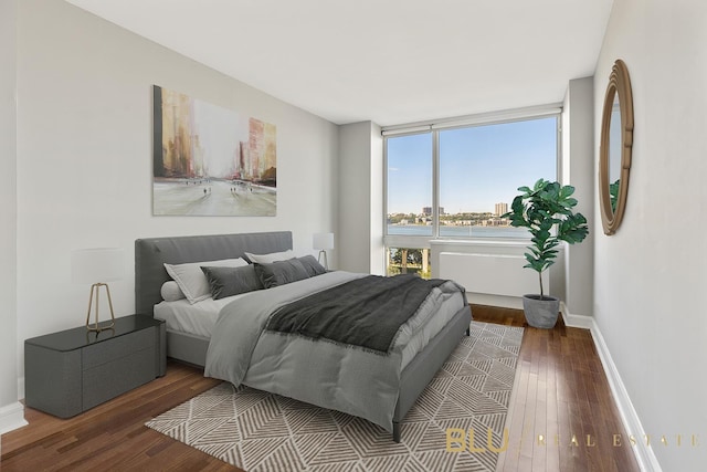 bedroom featuring hardwood / wood-style floors