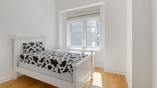 bedroom featuring light wood-type flooring