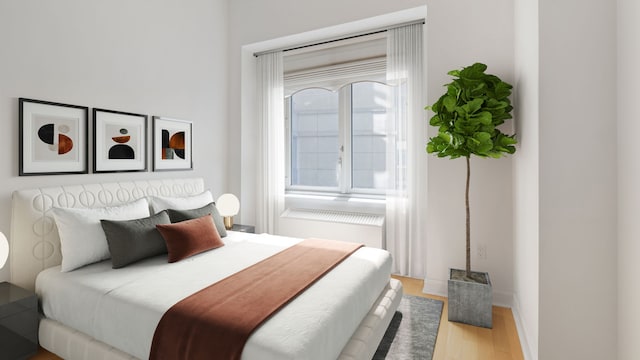 bedroom featuring hardwood / wood-style floors