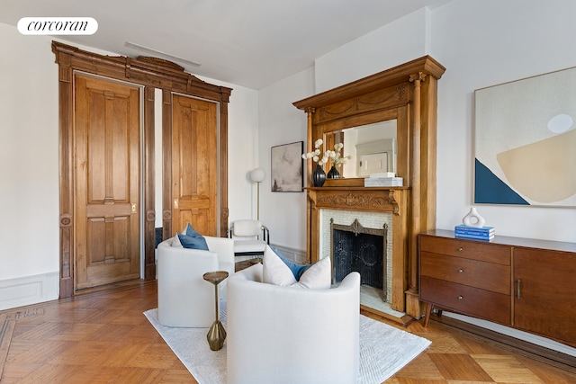 living room with light parquet floors