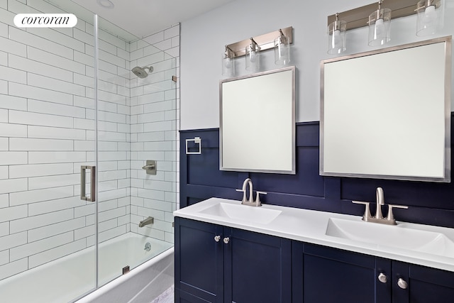 bathroom featuring vanity and enclosed tub / shower combo