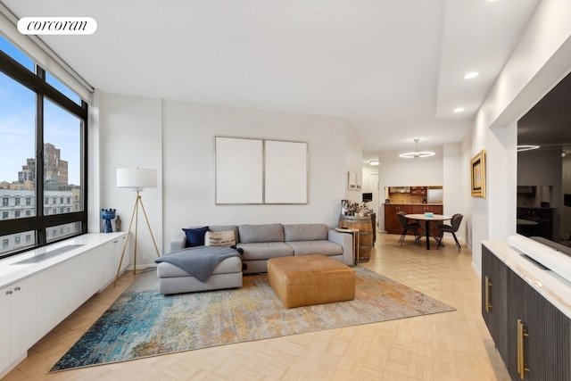 living room featuring light parquet floors