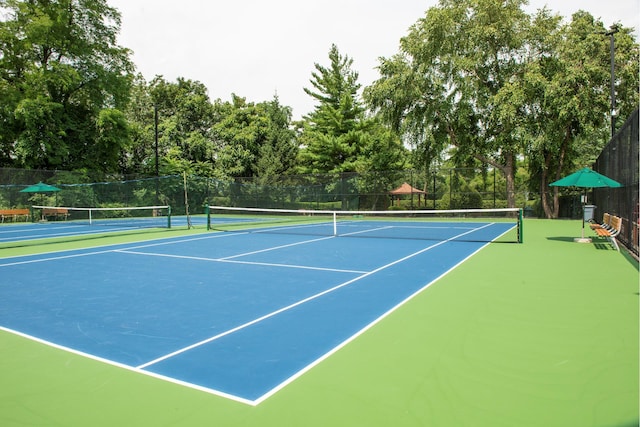 view of tennis court with basketball court