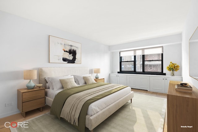 bedroom featuring light hardwood / wood-style floors