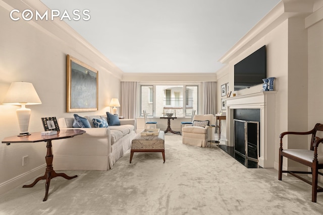 living room featuring carpet and ornamental molding