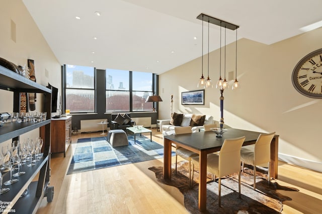 dining room with light wood-type flooring