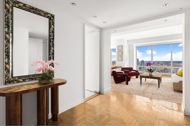 hallway featuring parquet floors