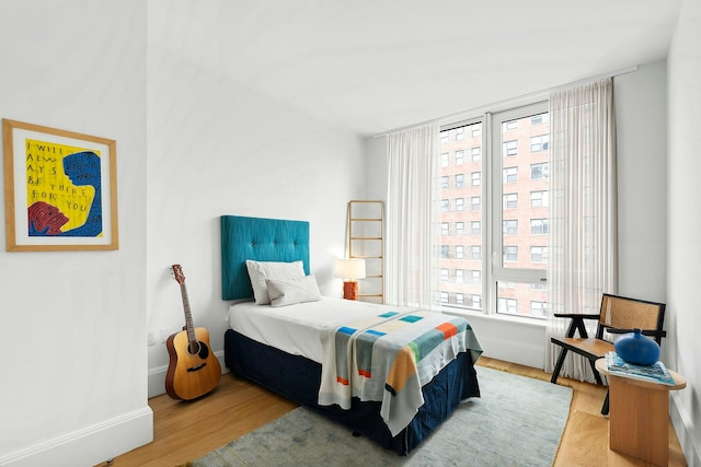 bedroom featuring hardwood / wood-style floors