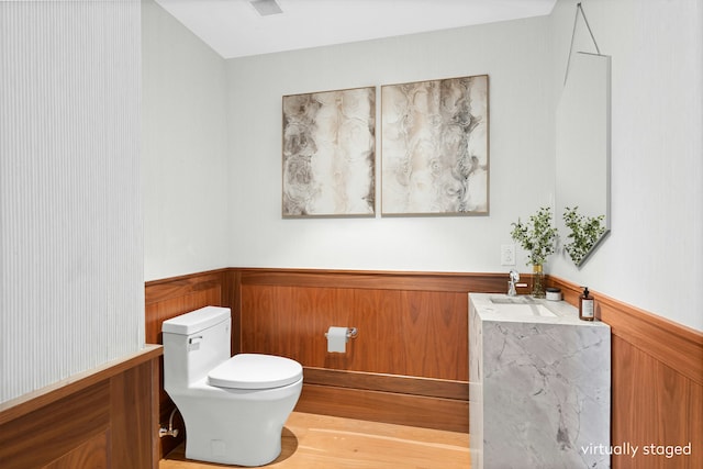 bathroom with toilet and sink