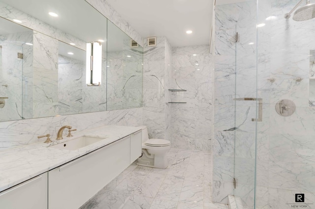 bathroom with vanity, toilet, walk in shower, and tile walls