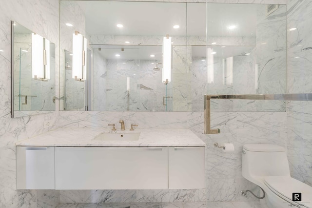 bathroom featuring vanity, toilet, and an enclosed shower