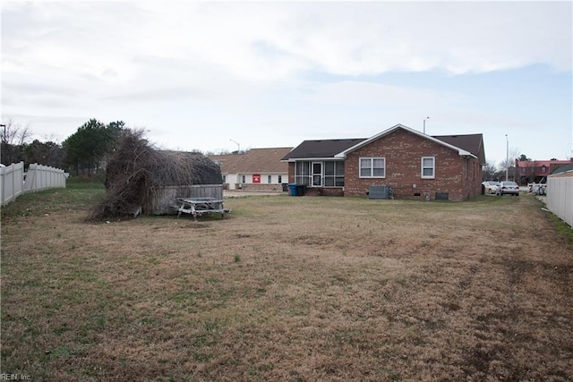 view of yard featuring central AC unit