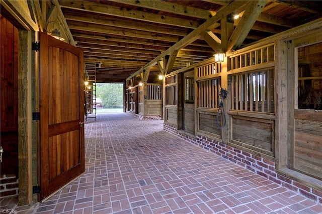 view of horse barn featuring an outdoor structure