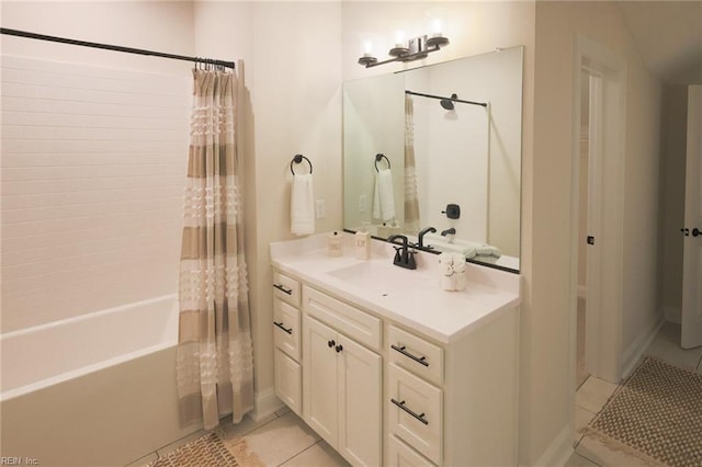 bathroom with tile patterned floors, shower / bathtub combination with curtain, and vanity