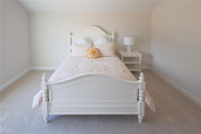 bedroom with light colored carpet