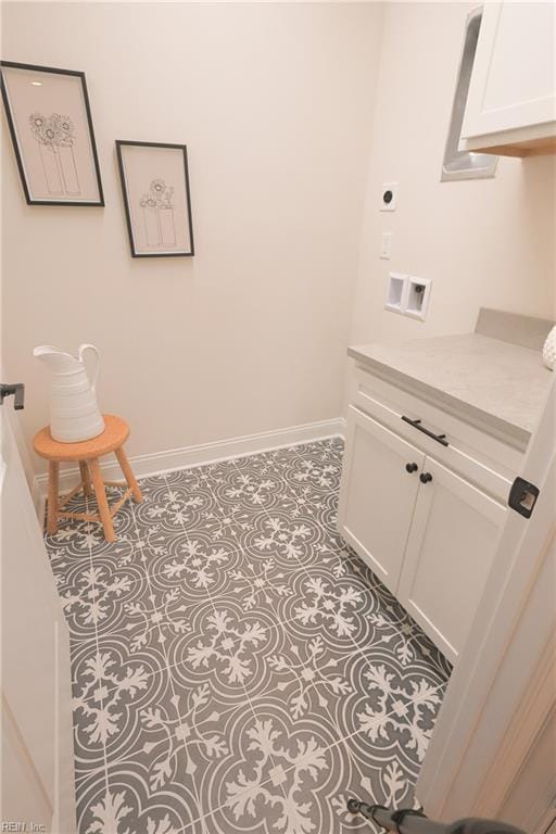 bathroom featuring vanity and tile patterned flooring