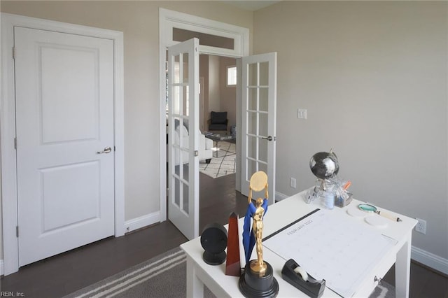 office space with dark wood-type flooring and french doors