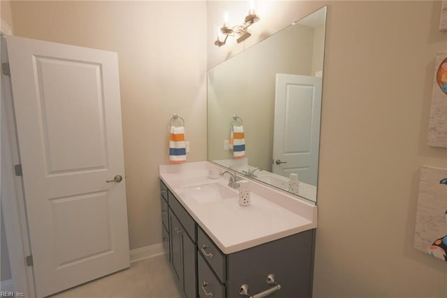 bathroom with vanity and tile patterned flooring