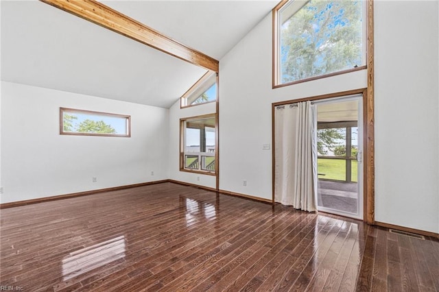 interior space featuring high vaulted ceiling, dark hardwood / wood-style flooring, and beamed ceiling