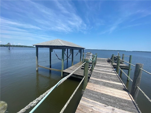 view of dock with a water view