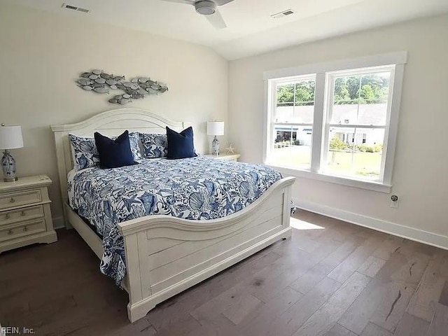 bedroom featuring ceiling fan and dark hardwood / wood-style flooring