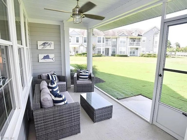 sunroom / solarium with ceiling fan