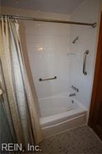 364 Millers Ln, Susan, VA 23163 - bathroom with shower / bathtub combination with curtain
