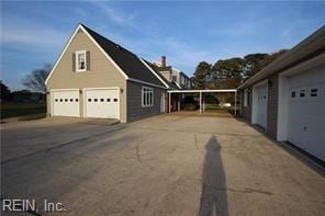 364 Millers Ln, Susan, VA 23163 - view of property exterior with a detached garage and an outdoor structure