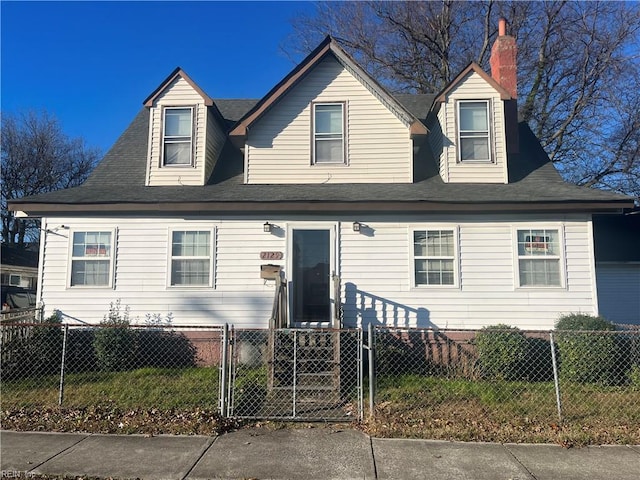 2129 Vincent Ave, Norfolk, VA 23504 - cape cod home with a fenced front yard, a chimney, and a gate