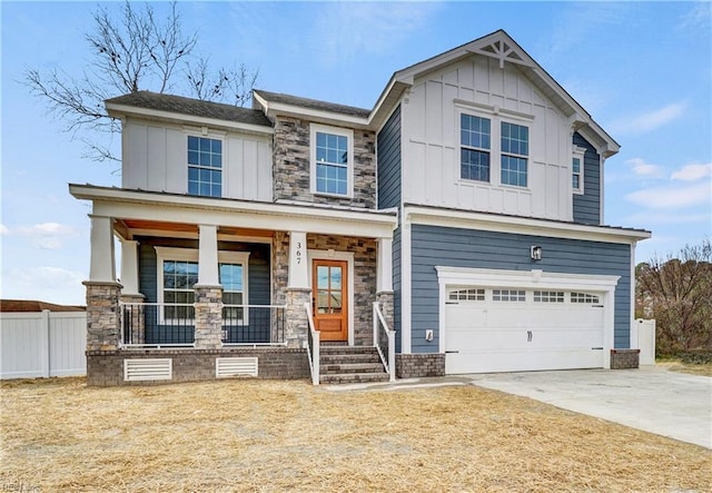 craftsman inspired home featuring covered porch and a garage