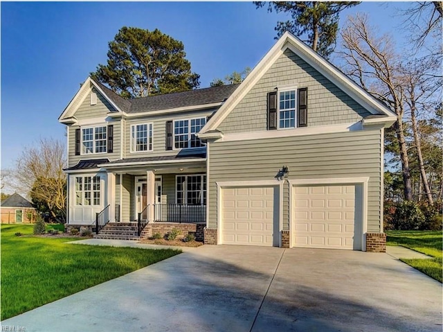 craftsman-style home featuring a front yard, covered porch, and a garage