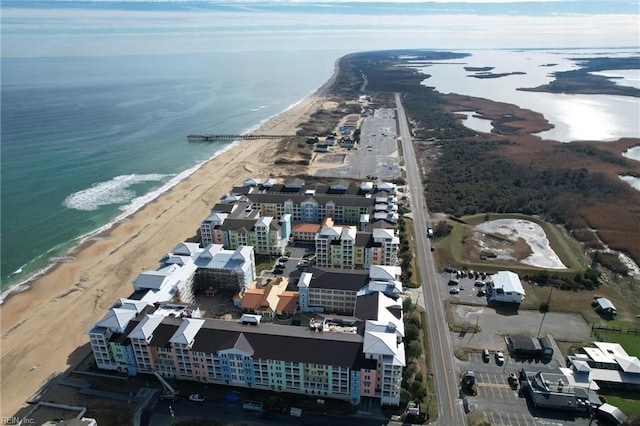 bird's eye view with a water view and a view of the beach