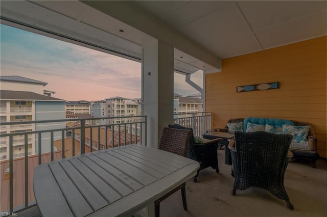 view of balcony at dusk