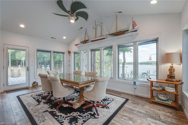 dining space featuring ceiling fan, a healthy amount of sunlight, and light hardwood / wood-style flooring