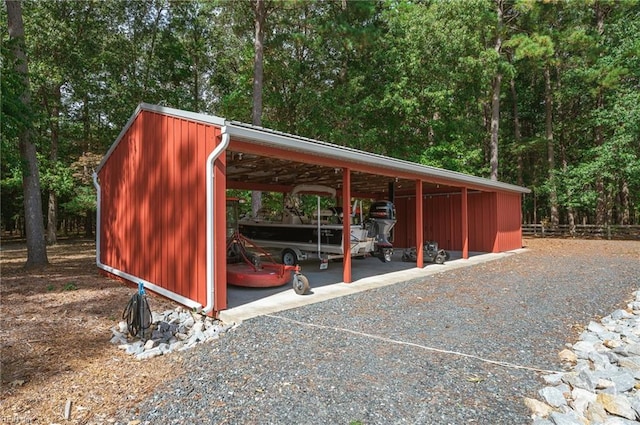 view of outdoor structure with a carport