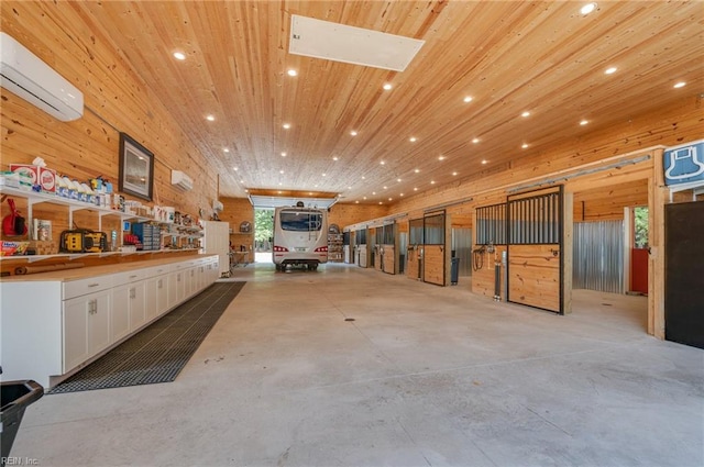 view of horse barn with a wall unit AC