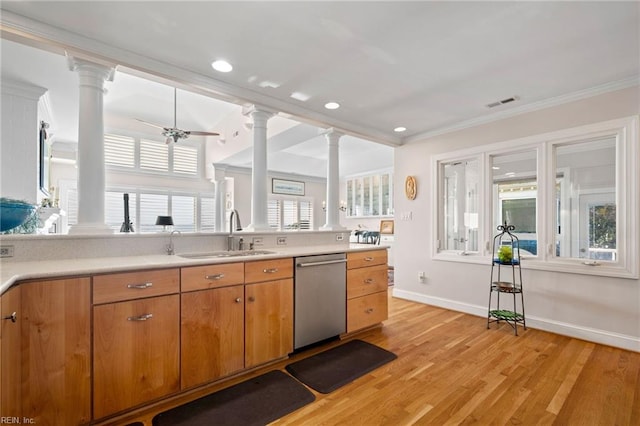 kitchen featuring sink, ceiling fan, ornamental molding, stainless steel dishwasher, and light hardwood / wood-style floors