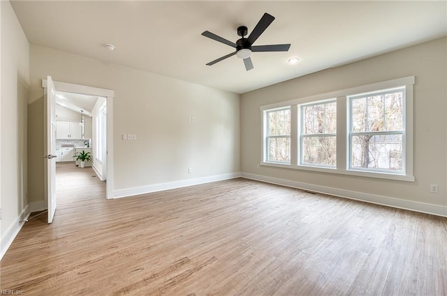 unfurnished room with light hardwood / wood-style floors and ceiling fan