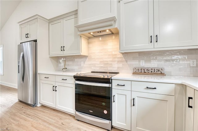 1208 Hitchens Ln, Williamsburg, VA 23188 - kitchen featuring stainless steel appliances, light countertops, light wood-style flooring, and decorative backsplash