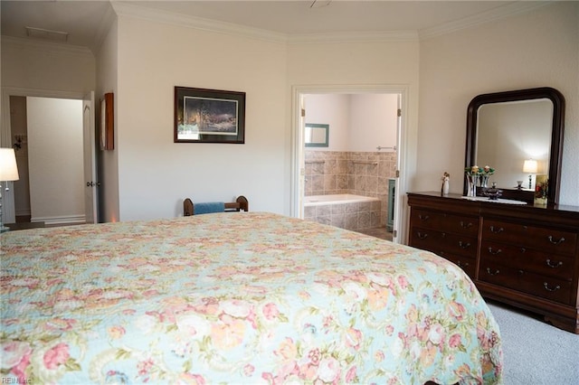 carpeted bedroom featuring crown molding and ensuite bath