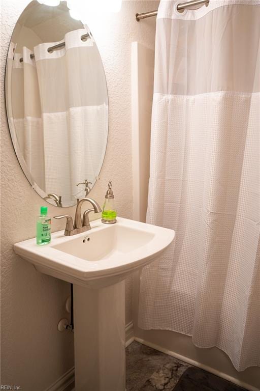 bathroom with tile floors