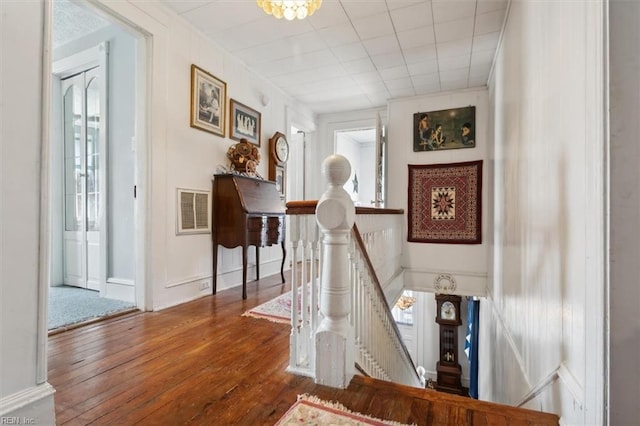 staircase featuring dark wood-type flooring