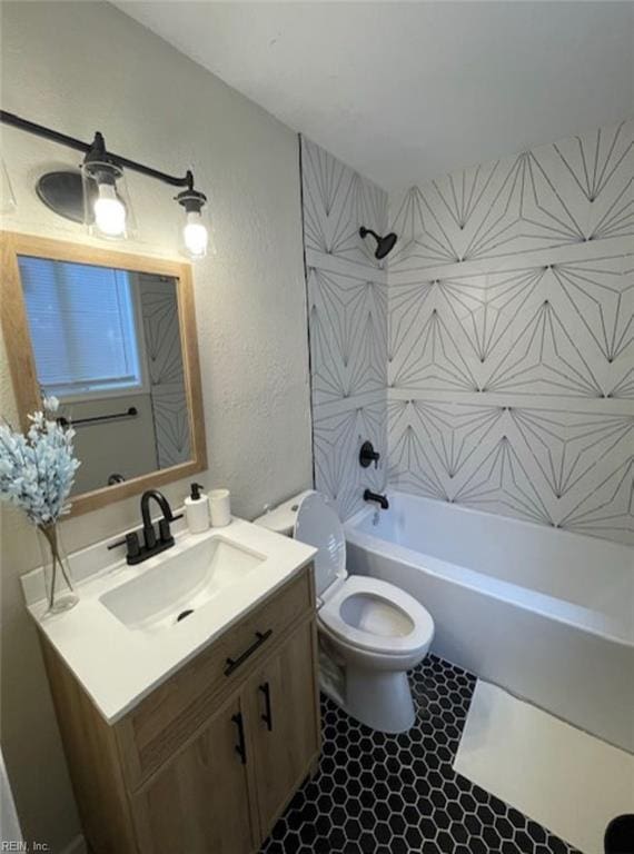 full bathroom with shower / bathing tub combination, toilet, tile flooring, and large vanity